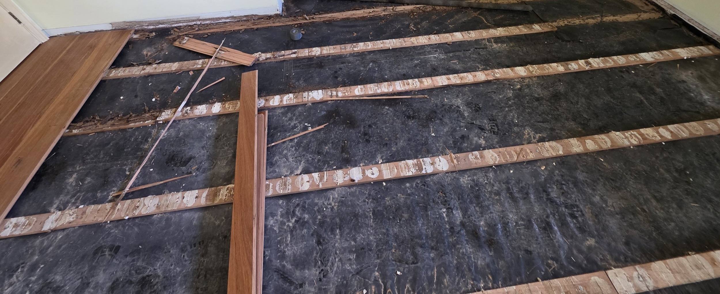 Floor battens exposed after the timber flooring was lifted