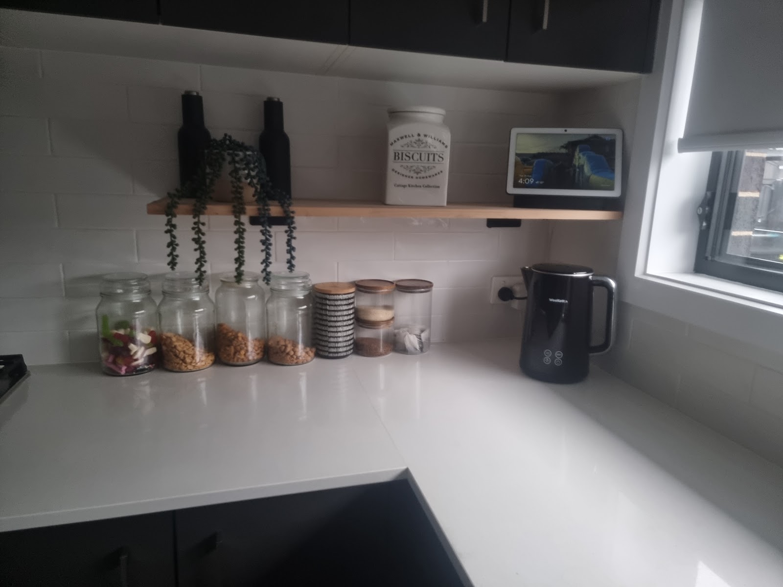 Kitchen benchtop with a new open timber shelf
